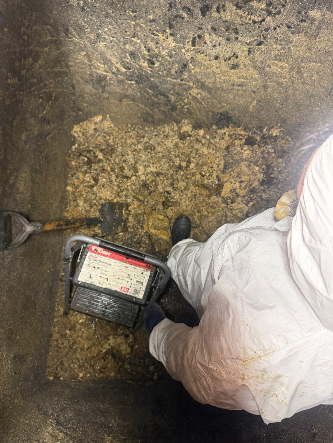 Confined space sewer entry — certified crew, done safely.